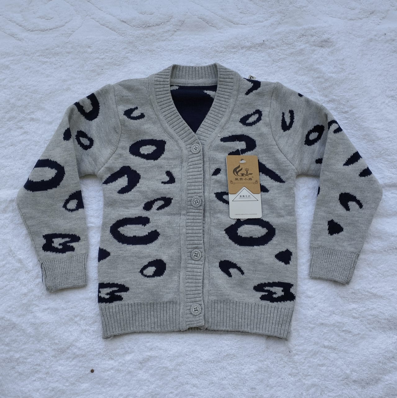 SWEATER KIDS BUTTON (PATCHED)
