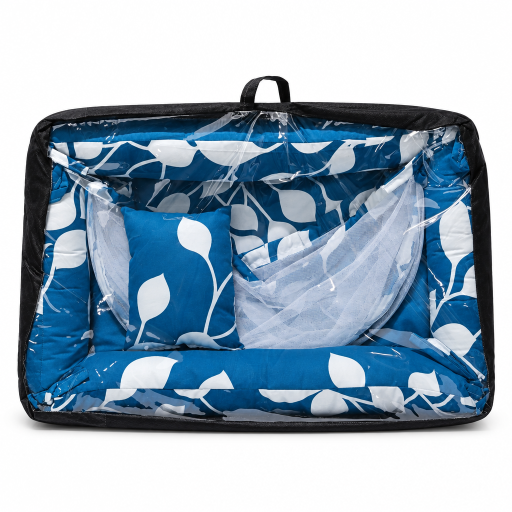 Co-sleeper in blue and grey geometric print, packaged